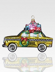 With packages piled high on its roof and a wreath hanging on the door, this charming ornament delivers a Big Apple Christmas greeting! Polonaise hand-blown glass About 5 high Made in Poland With packages piled high on its roof and a wreath hanging on the door, this charming ornament delivers a Big Apple Christmas greeting! Polonaise hand-blown glass About 5 high Made in Poland