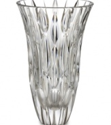 A pattern of raindrops suspended in this exquisite crystal vase creates an always-sunny arrangement. The gently flared rim and substantial weight combine in a sparkling example of enduring grace and quality.