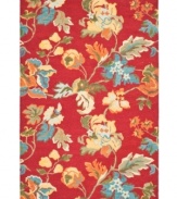 A wonderfully ornate home accent, the Blossom area rug infuses a comforting red ground with vibrant, modern florals. Made exclusively in India, it features a detailed construction of long wool fibers, making it soft, yet durable enough to withstand heavy traffic in any room.