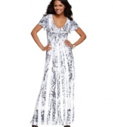 A maxi dress with a whole new look, from Style&co. The flowing silhouette gets a glam makeover with studs and feminine flutter sleeves!