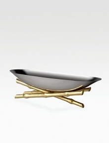 A contemporary piece with natural, organic detail in gleaming stainless steel with alloy metal feet and 24k goldplated bamboo detail. From the Evoca CollectionStainless steel with alloy metal and 24k goldplate24L X 6H X 8WHand washImported A contemporary piece with natural, organic detail in gleaming stainless steel with alloy metal feet and 24k goldplated bamboo detail. From the Evoca CollectionStainless steel with alloy metal and 24k goldplate24L X 6H X 8WHand washImported