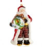 Santa Claus maps out his next delivery route in this Tartan-trimmed Polonaise ornament from Kurt Adler. Mouth-blown glass with elaborate hand-painted detail make it an instant classic.