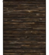 Western chic. Invite sumptuous style into your home with the one-of-a-kind Prairie rug from Calvin Klein. Tonal bars of rich cowhide are hand-tufted in an alternating pattern to create a stunning, mosaic-like appearance and a divinely textured feel.