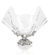 An eye-catching bowl adds sophistication to any gathering. Rendered in sand-cast, hand-finished aluminum, the base features a pattern of sculpted grapes. Complete with acrylic bowl.