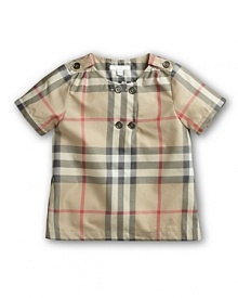 Teach little ones to appreciate classic design at a young age with timeless British cool from Burberry--the Tyra blouse features clean lines, charming button details and the brand's signature check print. Teach little ones to appreciate classic design at a young age with timeless British cool from Burberry--the Tyra blouse features clean lines, charming button details and the brand's signature check print.