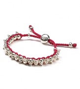 A unique friendship bracelet with sterling silver mini skulls from Links of London.