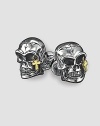 Polished sterling silver with a solid, 18k gold cross accent. About ½ X ¼ each Made in USA
