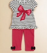 A pretty striped tunic is embellished with a bold bow and paired with soft, stretch-cotton pants to create a timelessly sweet look. Top Ruffled round necklineShort puff sleevesBack snapsRuffled hem Pants Elastic hemCottonMachine washImported Please note: Number of snaps may vary depending on size ordered 