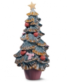 An interesting variation on the classic Christmas tree, Lladro's mini Christmas tree figurine is painted with Lladro's signature palette of soft pastels finished with a high-gloss glaze that catches the eyes. Handcrafted in Spain of pure porcelain. An interesting variation on the classic Christmas tree, Lladro's mini Christmas tree figurine is painted with Lladro's signature palette of soft pastels finished with a high-gloss glaze that catches the eyes. Handcrafted in Spain of pure porcelain.