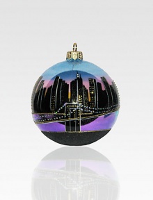 This hand-painted keepsake captures the magic of the Manhattan skyline, with its million sparkling lights and sky-scraping spires! Polonaise hand-blown glass About 4 in diameter Made in Poland