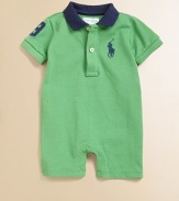 Short-sleeved polo shortall in soft, breathable cotton accented with a ribbed knit collar and applied twill 3 patch.Polo collarShort sleevesFront buttonsBottom snapsCottonMachine washImported Please note: Number of snaps may vary depending on size ordered. 