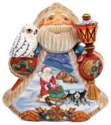 Intricately carved and detailed, this ornament from DeBrekht is a unique holiday treasure for your home with the hand painted scene of Santa Claus and his two sleigh dogs journeying to deliver gifts to all the good little girls and boys.