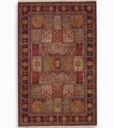 This long runner is ideal for hallways and entryways. A striking example of classic Bakhtiyari designs, this rug features organic motifs in a panel design of reds, greens and golds, finished with a rosette border. A special antique wash enhances and harmonizes the burnished colors to create a rich vintage finish. Woven in the USA of luxuriously soft premium worsted New Zealand wool.