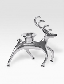 Prancing reindeer adds a spirited note to your holiday decor, hand-crafted of recycled aluminum.Holds standard taper candleAbout 6½L X 3W X 7HRecycled aluminumWipe cleanImported Prancing reindeer adds a spirited note to your holiday decor, hand-crafted of recycled aluminum.Holds standard taper candleAbout 6½L X 3W X 7HRecycled aluminumWipe cleanImported
