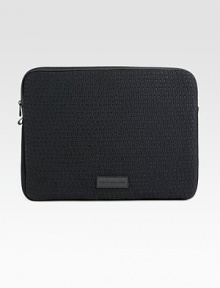 Protect your laptop in style with this lightly padded neoprene case finished with debossed logo detail and a signature patch.Zip closureNeoprene15¼W x 11½H x 1DImported Protect your laptop in style with this lightly padded neoprene case finished with debossed logo detail and a signature patch.Zip closureNeoprene15¼W x 11½H x 1DImported