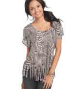 It's no optical illusion-this Living Doll top really looks this awesome. The bold graphic print and fringed hem can be dressed down for day or worn with heels and dark denim into the evening!