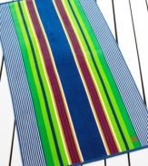 Preppy, multi-colored stripes offer a polished look in this Pacific Stripe beach towel from Lauren by Ralph Lauren. Features the Ralph Lauren logo in the corner.