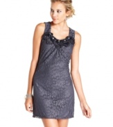 This lovely lace dress from Trixxi features a rosette trim with rhinestone and faux pearl accents to add subtle sparkle to your look!