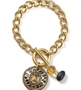 Get spotted in this bold charm bracelet from T Tahari. Not only does this style boast classic chunky chain links, but it comes accented by an exotic animal-print charm.