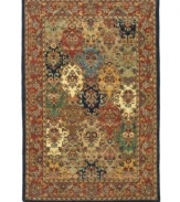 An eye-catching display of color and texture that finds its heritage in the rug-making techniques of ancient Persia. Tufted in India from pure wool, this Safavieh area rug is set in striking primaries with an all-over floral motif that adorns your floor with a visually stunning presence. (Clearance)