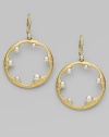 18K yellow gold scalloped hoops with graduated cultured pearls and small diamond accents.5.5mm - 3.5mm cultured pearls Diamond, 0.2 tcw 18K yellow gold Leverback closure Imported 
