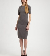 Impeccably tailored to fit the figure, this form-fitting style has a scuba-inspired feel.Jewel necklineShort sleevesPanel constructionBack ventConcealed back zipAbout 26 from natural waist72% polyester/24% rayon/4% spandexDry cleanMade in USAModel shown is 5'9½ (176cm) wearing US size 4. 