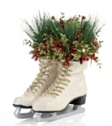 A fresh pair. Filled with holiday bouquets, these frosted white ice skates offer a whimsical expression of the season.