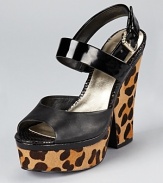 With a leopard printed heel and platform, these GUESS sandals make a slick statement for day or night.