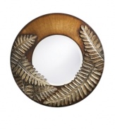 Look to nature for inspiration. Draped in brushed silver and bronze ferns, the Lilly wall mirror from Howard Elliot accents the bedroom or living room wall with rustic beauty.