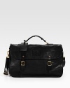 Rich vachetta leather lends elegant, heritage appeal to this iconic messenger bag, finished with a buckled flap closure and debossed logo patch. Buckle closure Top handle Adjustable, detachable shoulder strap ID tag Interior pockets Cotton drill lining 13W X 11H X 6D Imported 