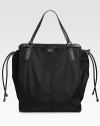 Lightweight packable nylon with adjustable leather drawstring fits beauty secrets, mags and more. Double top handles, 7½ drop Top zip closure Inside zip pocket Fully lined 14¼W X 16½H X 6½D Imported