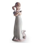 Two little kittens clamor for attention, waiting to snuggle with their sweet friend in the handcrafted Don't Forget Me figurine from Lladro.