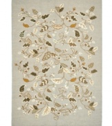 Natural whimsy. Perfectly graceful leaves upon scrolling vines make a mark of elegance upon rich woven pile. Hand tufted in India of long wool fibers, this luxurious area rug from Martha Stewart rugs presents unparalleled comfort and style underfoot.