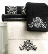 These dramatic towels are ornately designed after the classical beauty of Florentine art. The solid towel has  contrast floral embroidery on a wide dobby border, while the firenze towel is bold with a floral pattern on a contrast ground. Black and white firenze stripes adorn the third towel.