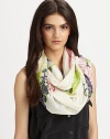A luxurious blend of silk and cashmere with a wild and romantic print. 50% silk/50% cashmereAbout 28 X 80Dry cleanImported 
