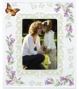 Spring is perpetually in season with whimsical Butterfly Meadow giftware. Colorful blooms and a playful butterfly mingle on this white porcelain picture frame, creating an extra-sweet scene for precious memories. Qualifies for Rebate