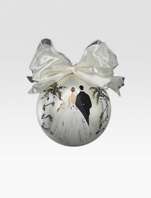 An oversized glass globe is individually handpainted with the image of a bride and groom at the altar, then detailed with glittering Austrian crystals. An ideal gift or ornament arrives in a presentation box perfect for giving. 12 diam. Imported 