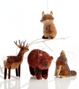 Into the woods. Breathe new life and personality into your tree with a menagerie of forest creatures made of natural buri. Featuring a raccoon, deer, bear and wolf, all from Martha Stewart Collection.
