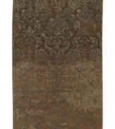 An antique-inspired damask design is intricately rendered with a deconstructed finish in the Devan area rug from Karastan. Crafted of New Zealand wool for ultimate comfort and supreme durability.