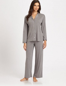 This traditional two-piece set rendered in soft jersey fabric is the ultimate in luxurious sleepwear. Notch collarDropped shouldersLong sleeves with banded cuffsButton frontElastic waistbandInseam, about 2965% modal/35% polyesterMachine washImported
