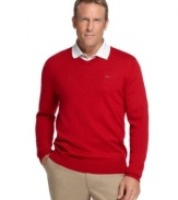 For cooler days on the course, layer up and keep your score low with the sleek polish of this merino wool blend sweater. (Clearance)