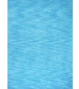 Varying shades of aqua blue create a lush texture that's sure to make waves in your home. Crafted by hand-tufting fibers of soft, rich wool, this area rug from St. Croix is rustic and refined, boasting a tonal flow that adds subtle dimension to your decor.