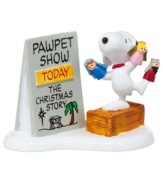 The story of Christmas unfolds like never before in Snoopy's very own pawpet show. A must-see in Peanuts Village, from Department 56.