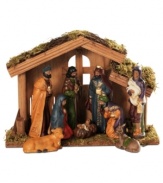 Adorning onlookers peer at the new born Baby Jesus in this Ethnic nativity scene, perfect for anywhere in the home to remind friends and family of the true miracle of Christmas.