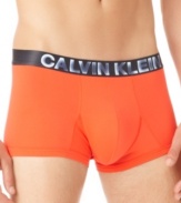 These Calvin Klein micro trunks have a bold color and a body defining fit for a look that's stylish and sleek.