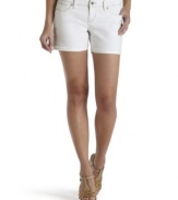 For a look that flaunts effortless cool, pair Levi's frayed cuffed shorts with platforms and a comfy tank!