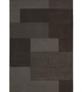 An abstract pattern makes a bold, modern statement upon this inviting Bowery area rug from Calvin Klein. Generously thick wool fibers are hand tufted in India for remarkable strength and detailed design.