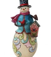 With a cardinal in his hand, Frosty the Snowman captures the wonder of the season. A spectrum of pastel hues and folk art-inspired shapes dance across this cheery snowman.