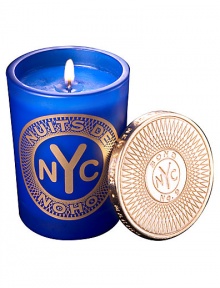 From a uniquely New York collection of scents, this avant garde aroma celebrates this urbane, downtown enclave.  · Blend of bergamot, jasmine and patchouli  · Made of the finest wax and wicks  · In sturdy, tinted glass container  · Gilt metal cap keeps scent from fading 