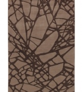 Taking artwork to a whole new level, this impressive area rug boasts a bold, clean-lined abstract design rendered in rich earth tones. Crafted from two-ply nylon yarn to impart a soft hand and a dense pile that is eminently durable and easy to clean.
